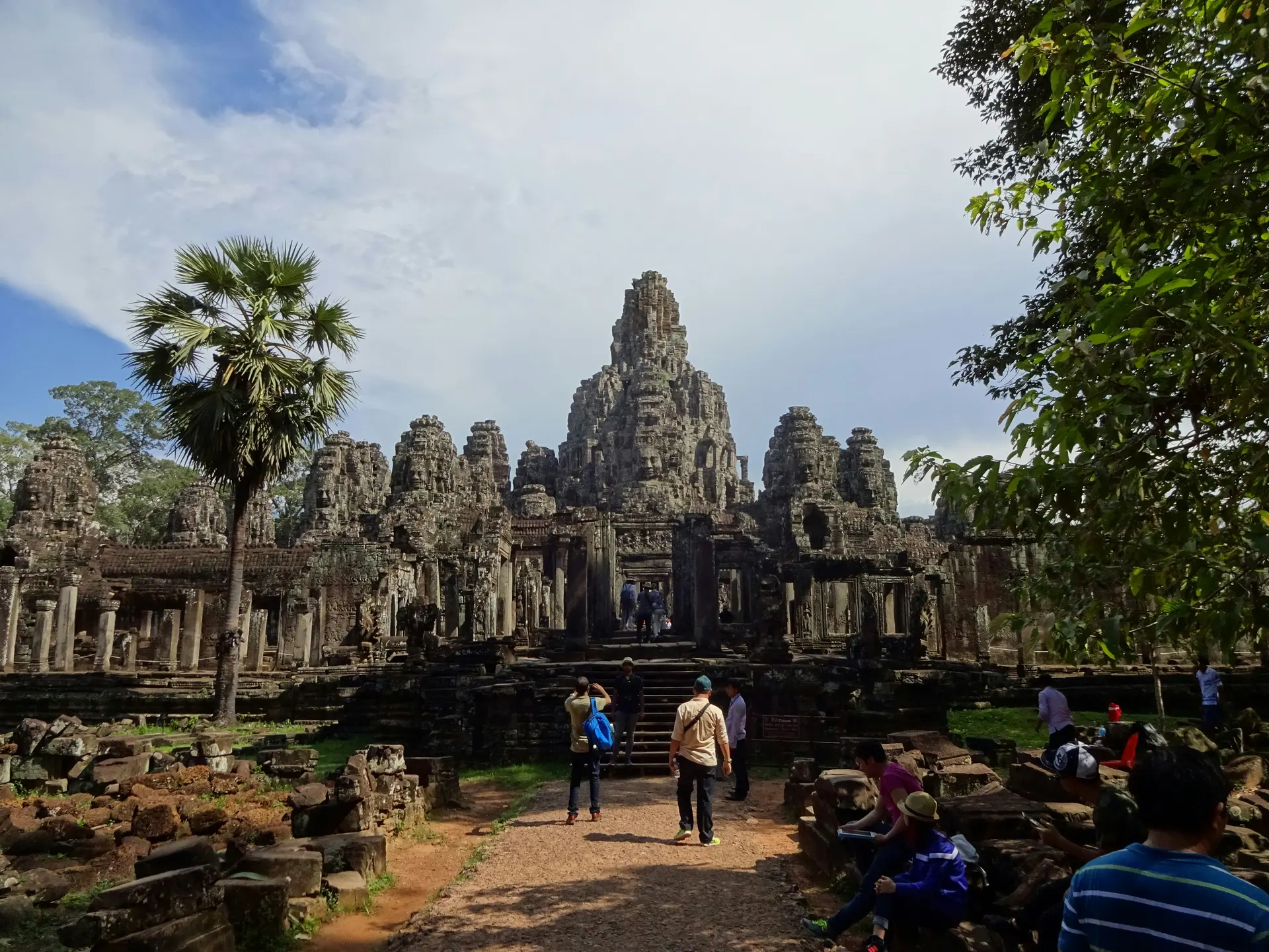Visitors before a temple in Cambodia